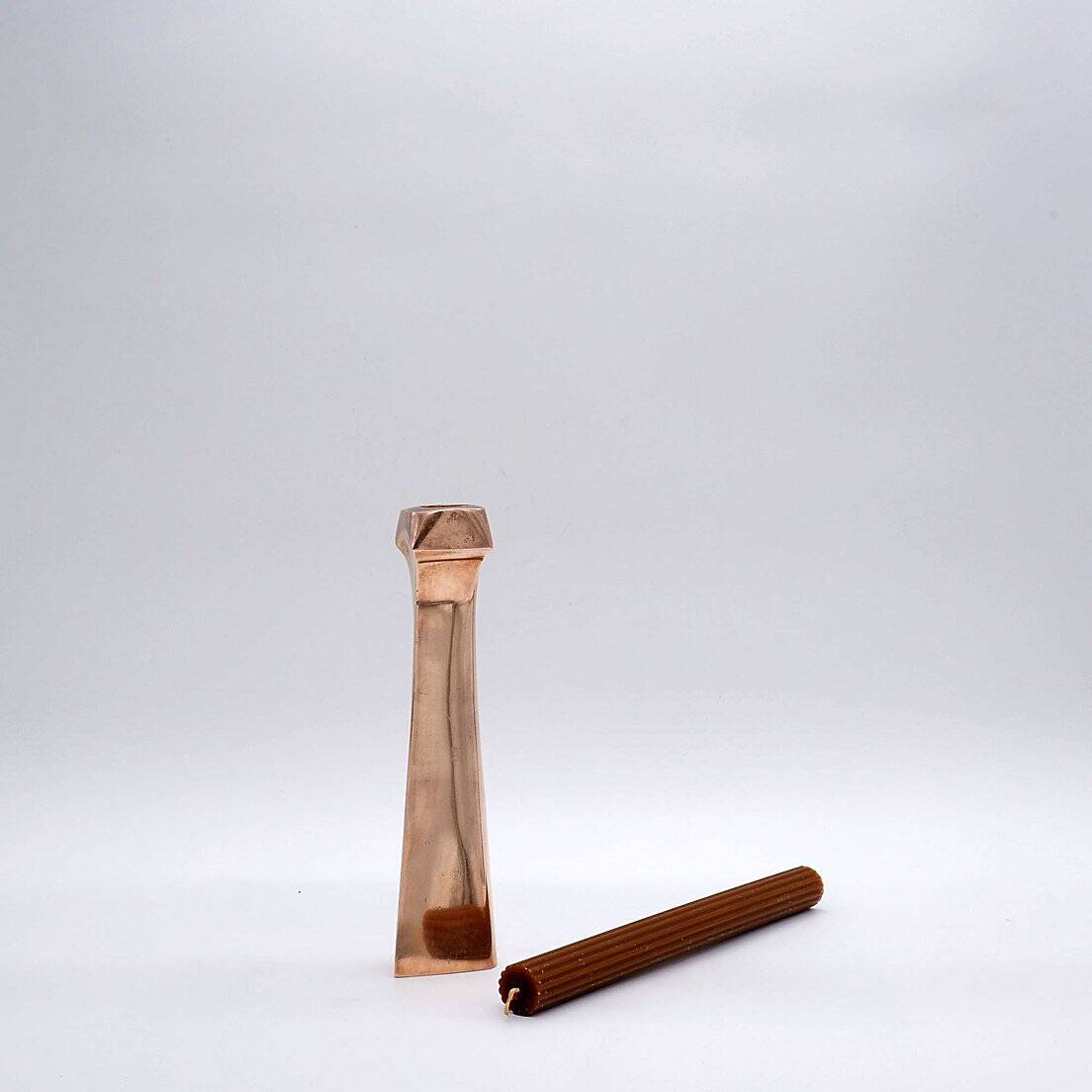 Sculptural copper candle holder