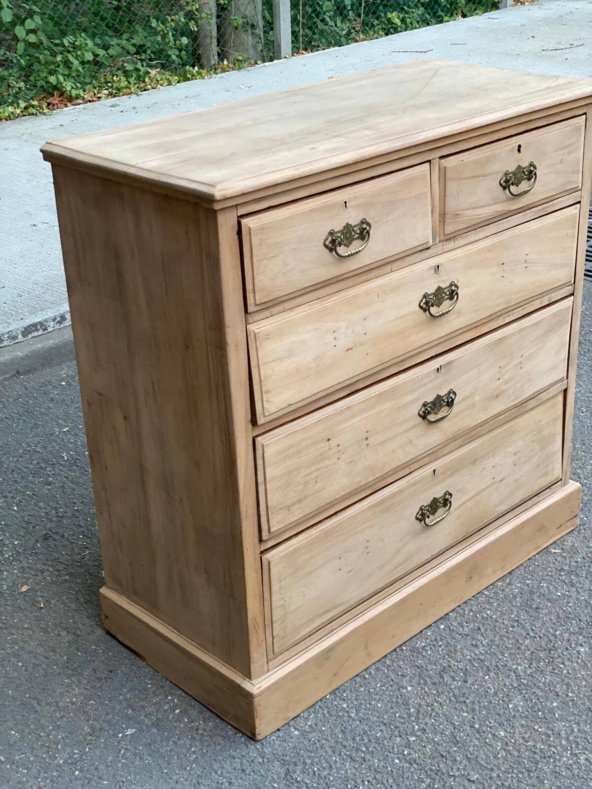 English stripped commode made of solid raw wood from the 19th century.