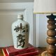 Old Japanese sake bottle in tokkuri shape.