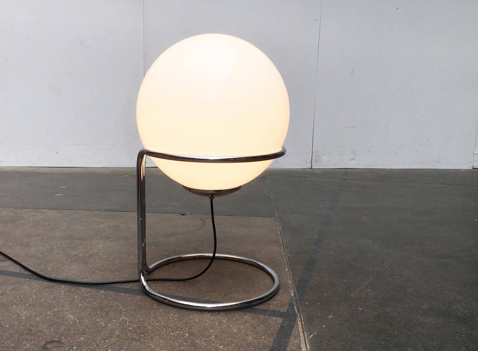 Vintage globe floor lamp in glass and chrome from the space age.