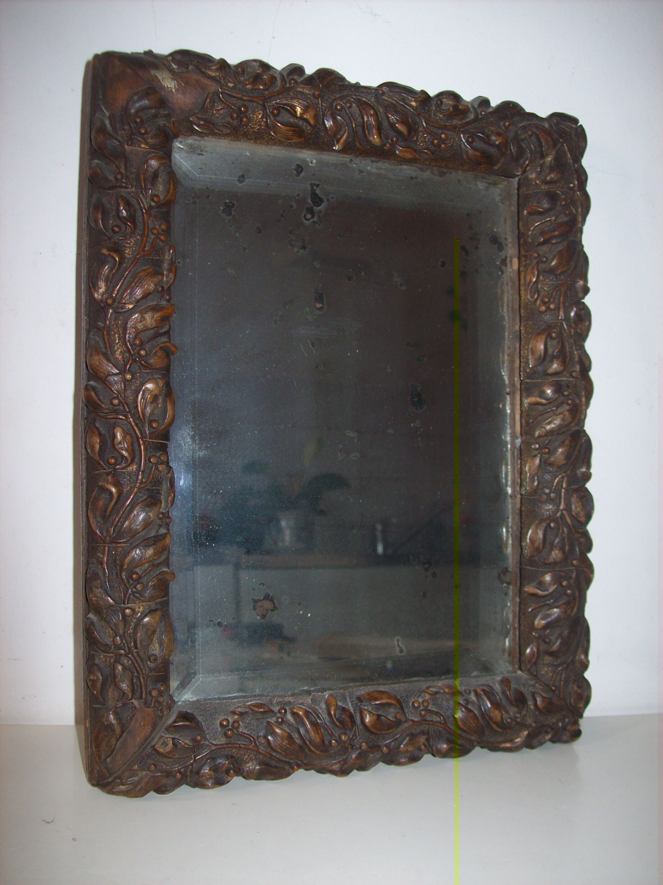 Antique mirror in beveled glass