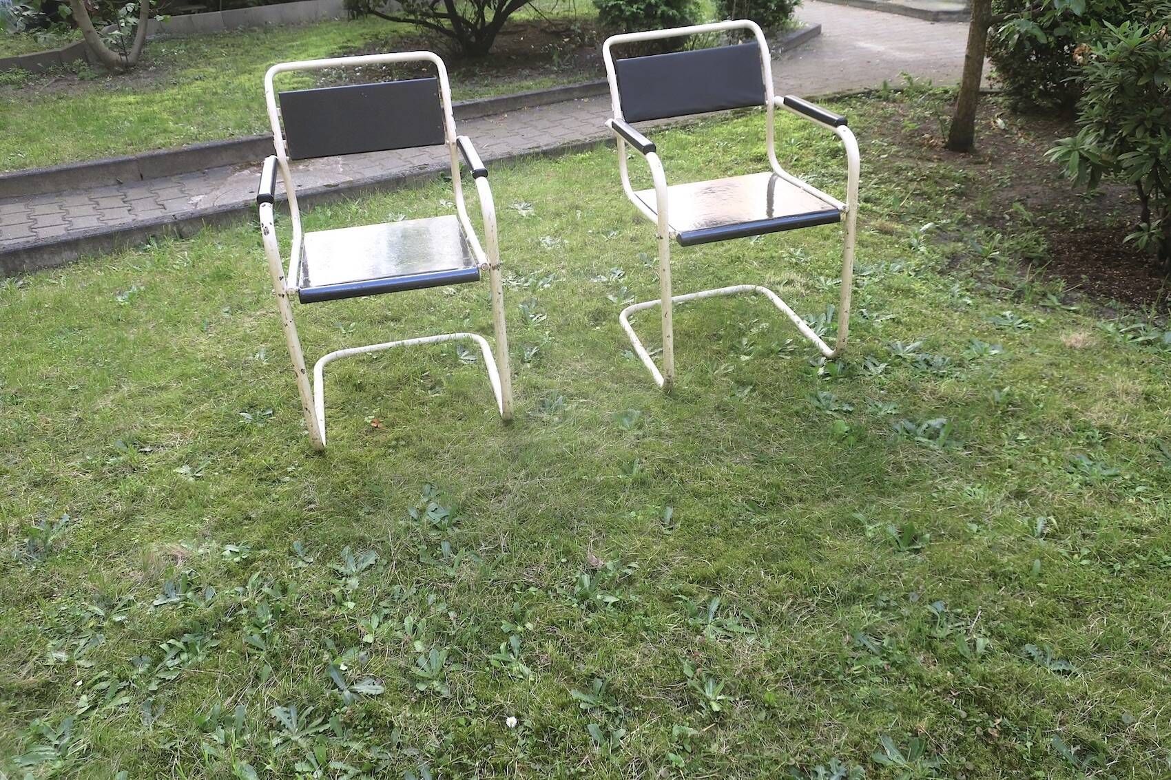 Pair of mid century cantilever iron and wood painted garden chairs, 1950s