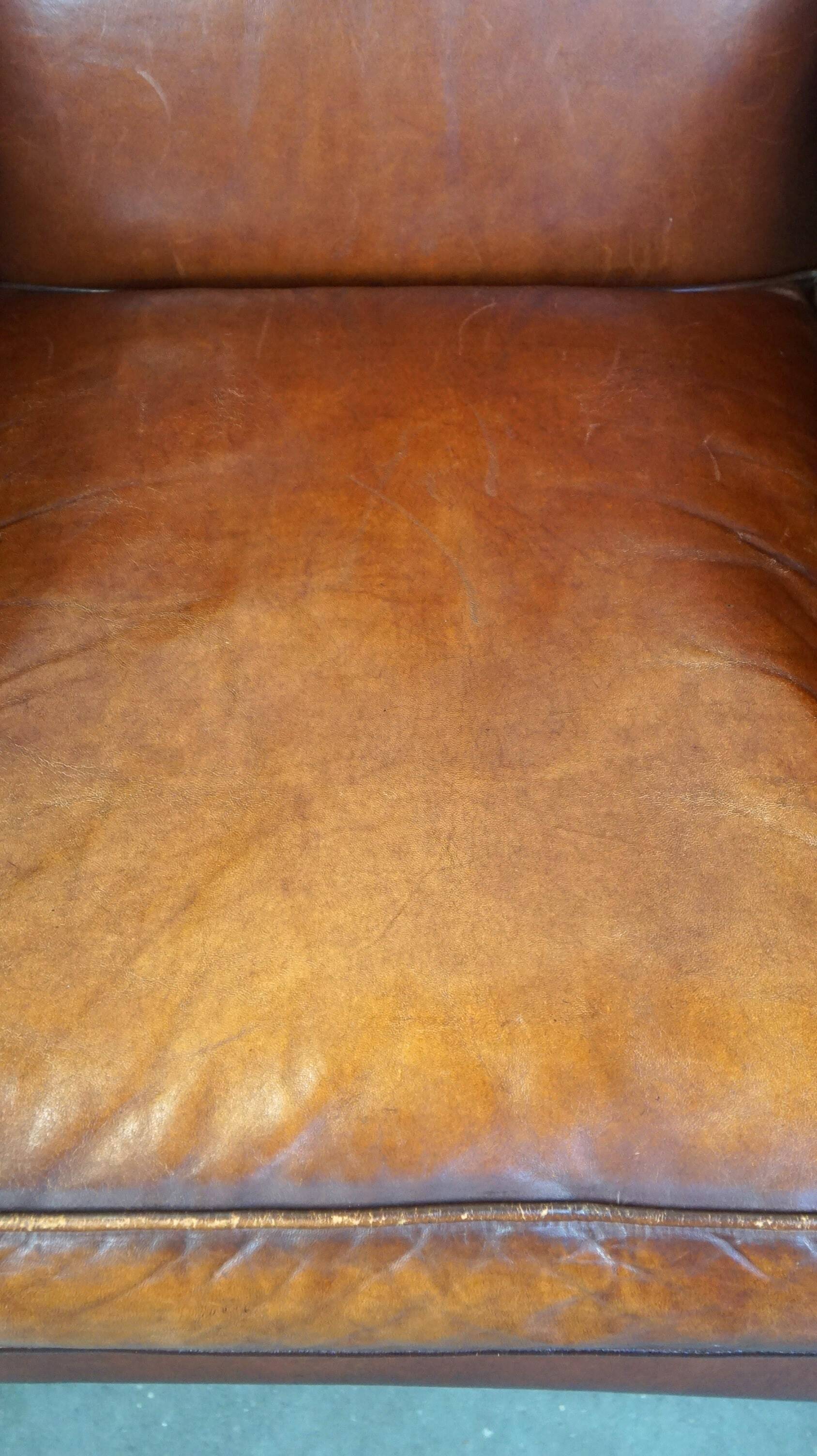 Beautiful and Comfortable Sheepskin Wingback Armchair with a Wonderful Patina