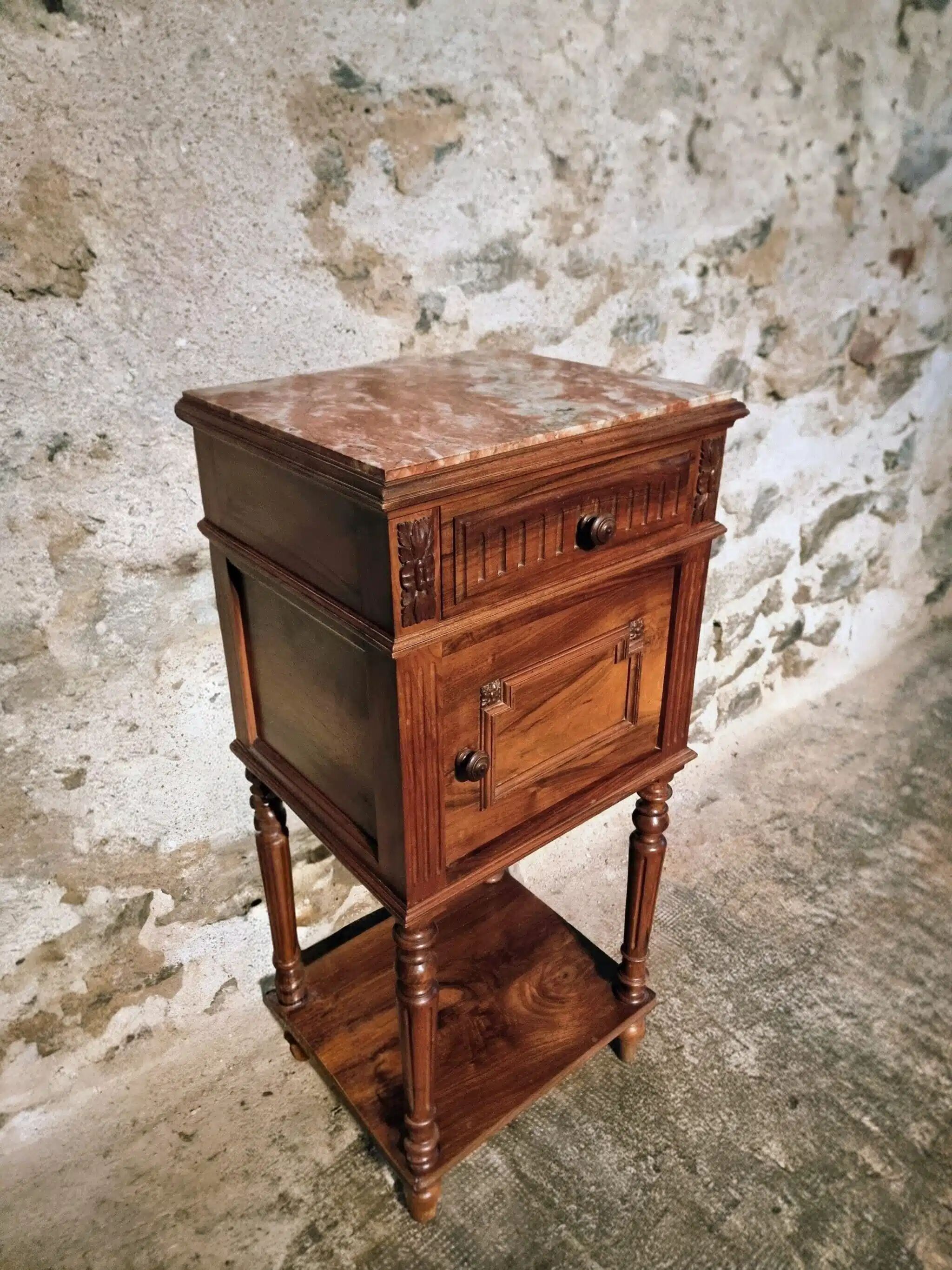 Antique French bedside table with a marble top.