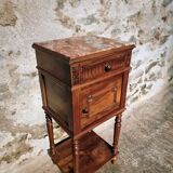 Antique French bedside table with a marble top.