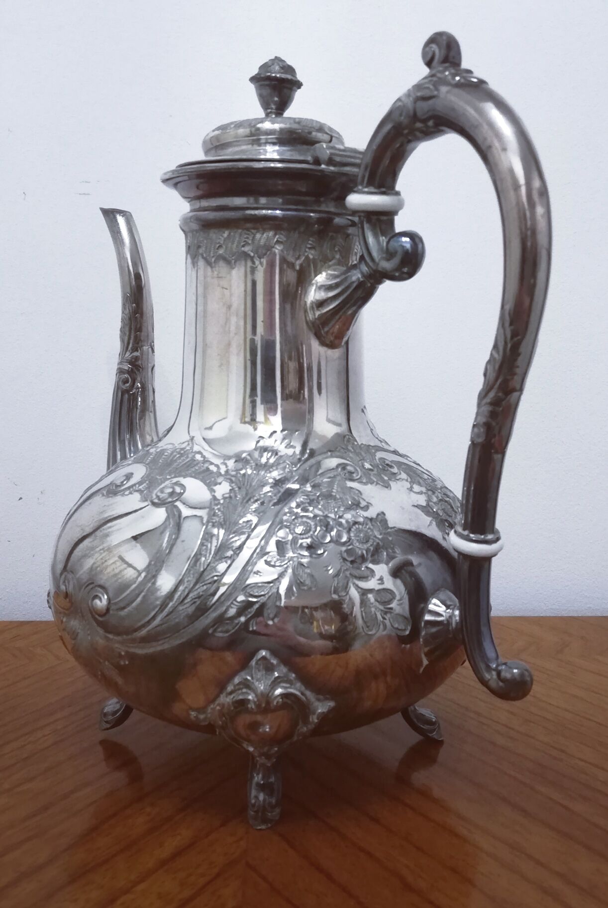 Silver metal teapot in Louis XV style