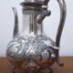 Silver metal teapot in Louis XV style