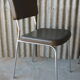 3 bronze-green faux leather chairs with chrome frames