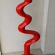 Red sculpture by Döman Tony Almen and Peter Gest