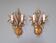 Pair of Italian wall sconces in gilded metal