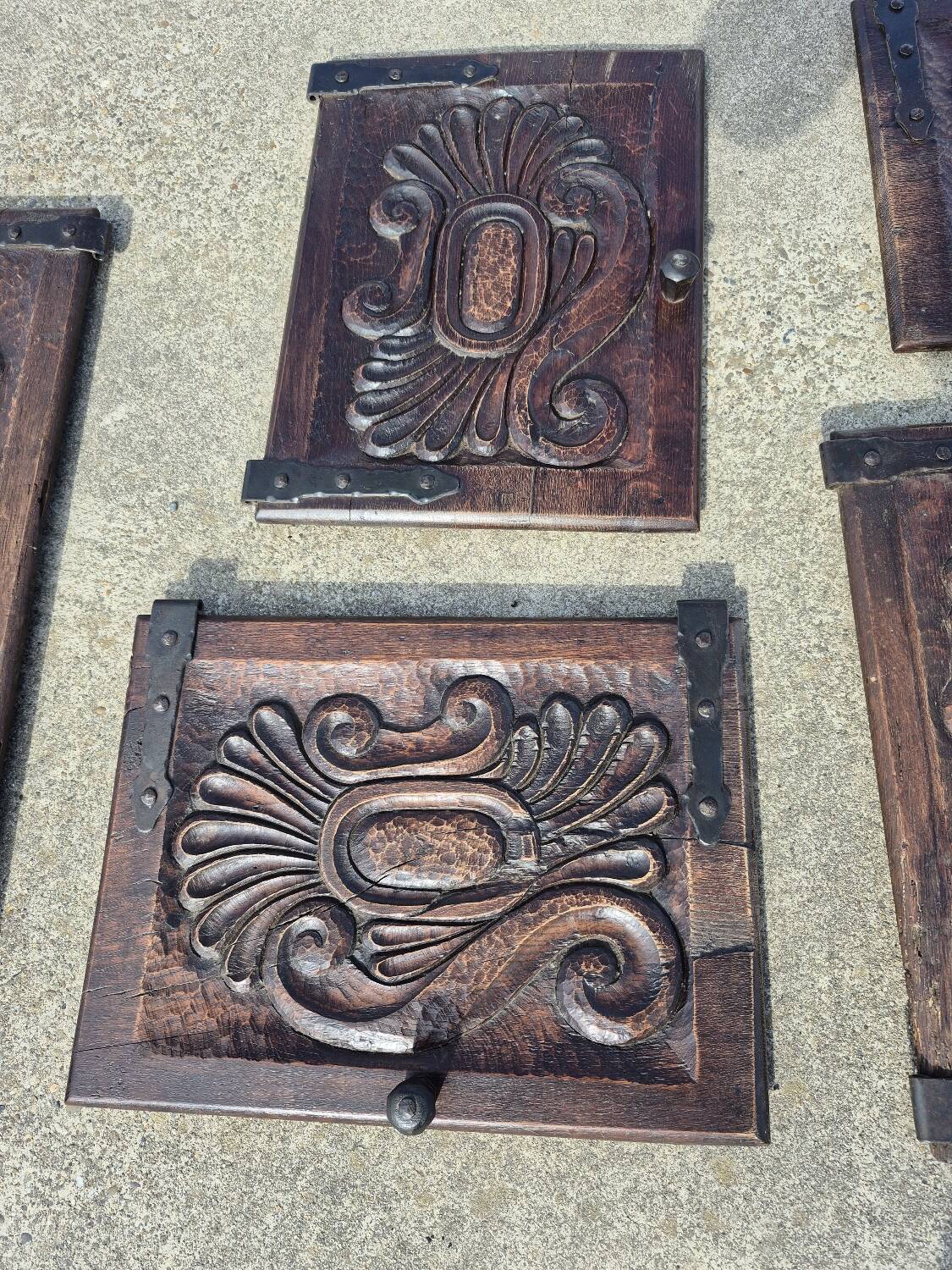 antique cabinet with carvings and wrought iron fittings rural