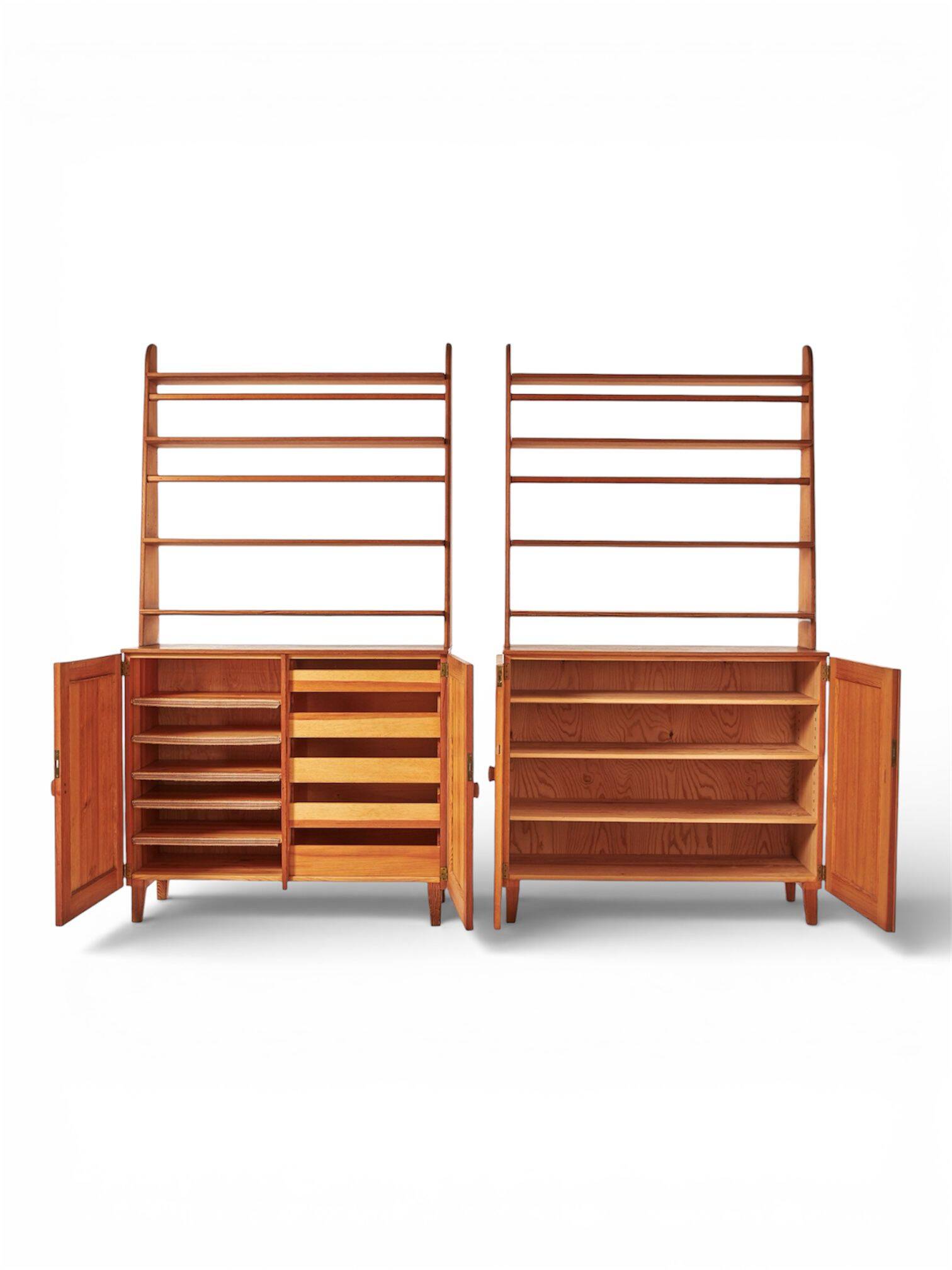 Pine libraries by Carl Malmsten with cabinets, pair, Sweden, 20th century