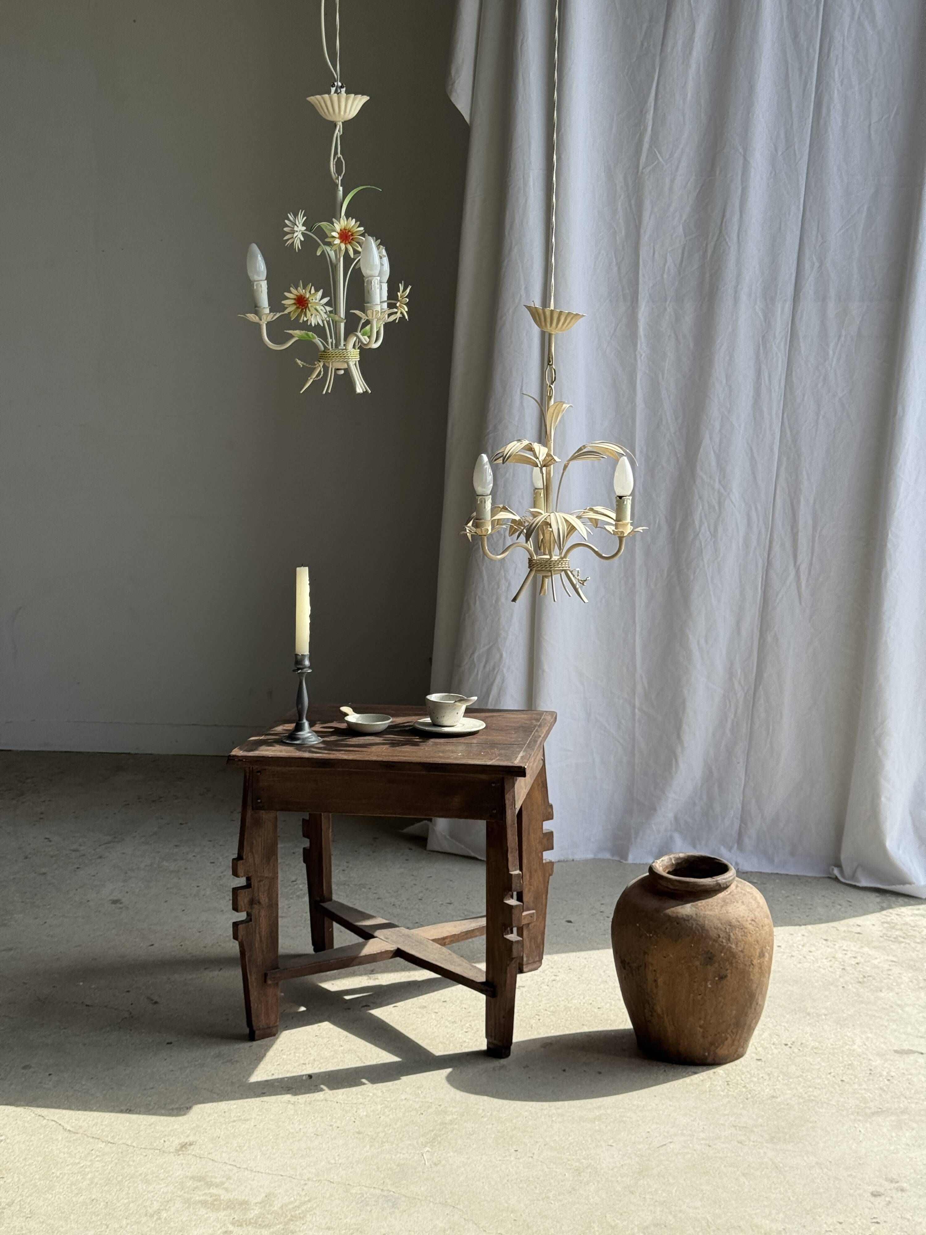 Small vintage cream metal flower chandelier with orange flowers and 3 arms.