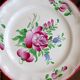 Three small hand-painted Saint-Clément dinner plates.