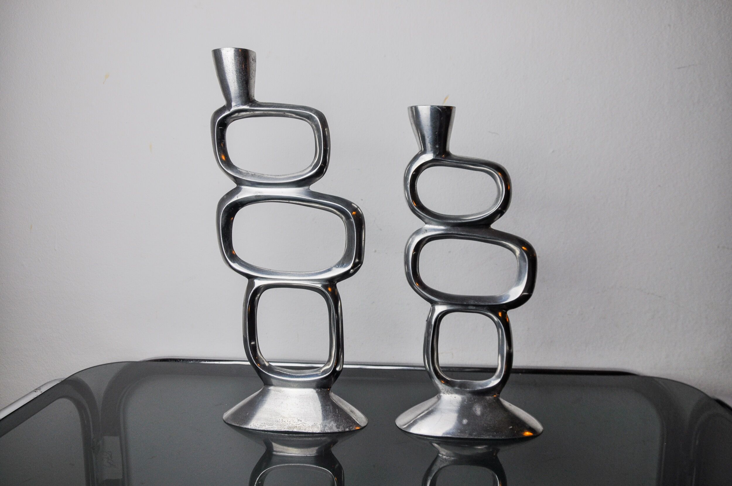 Pair of circle candlesticks by Matthew Hilton, England, 1980