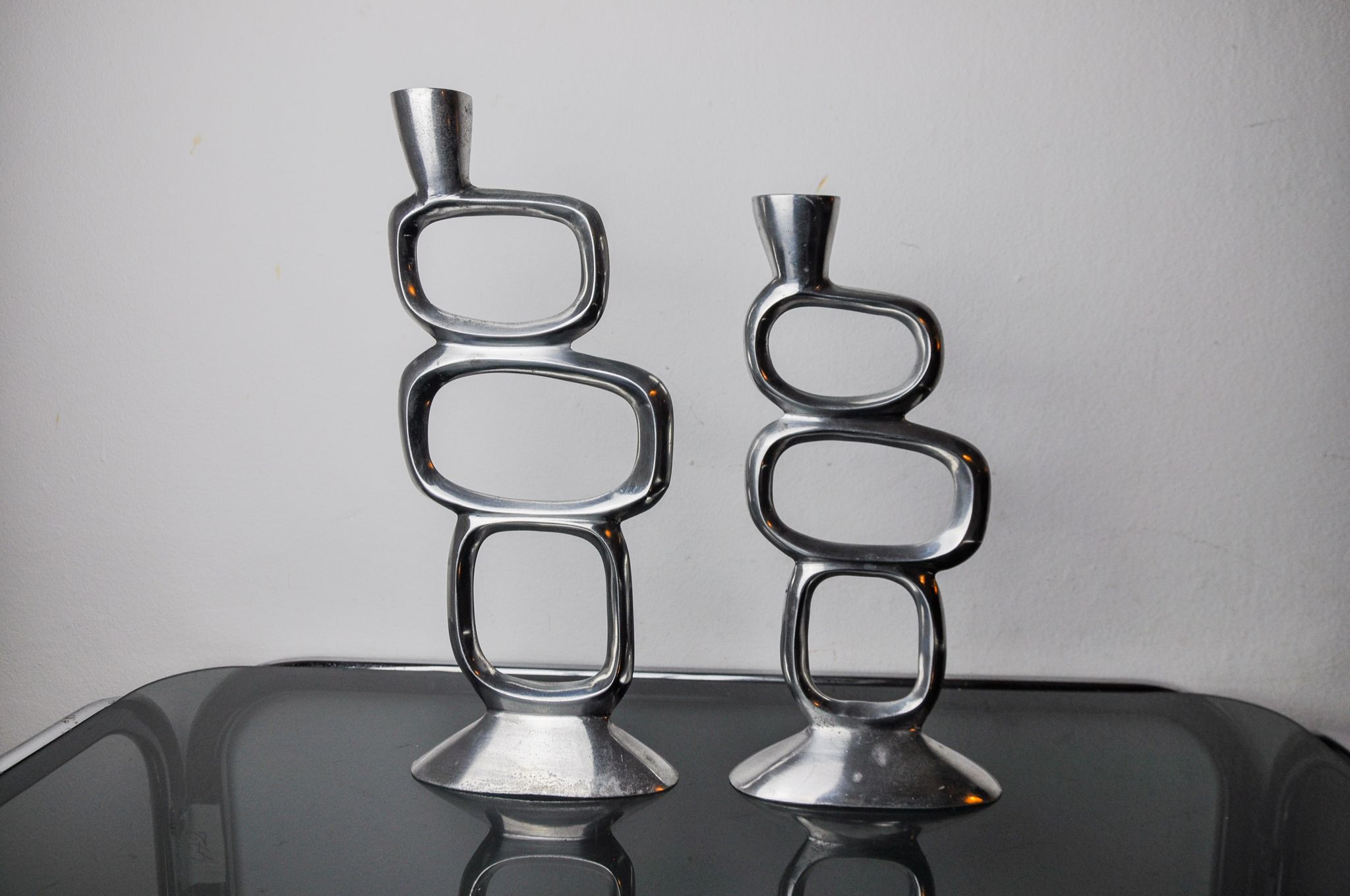 Pair of circle candlesticks by Matthew Hilton, England, 1980