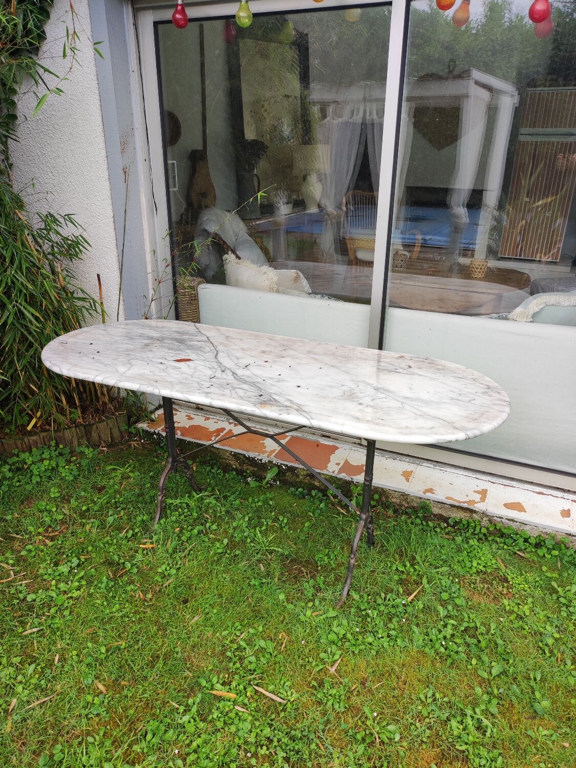 Large marble and wrought iron bistro table