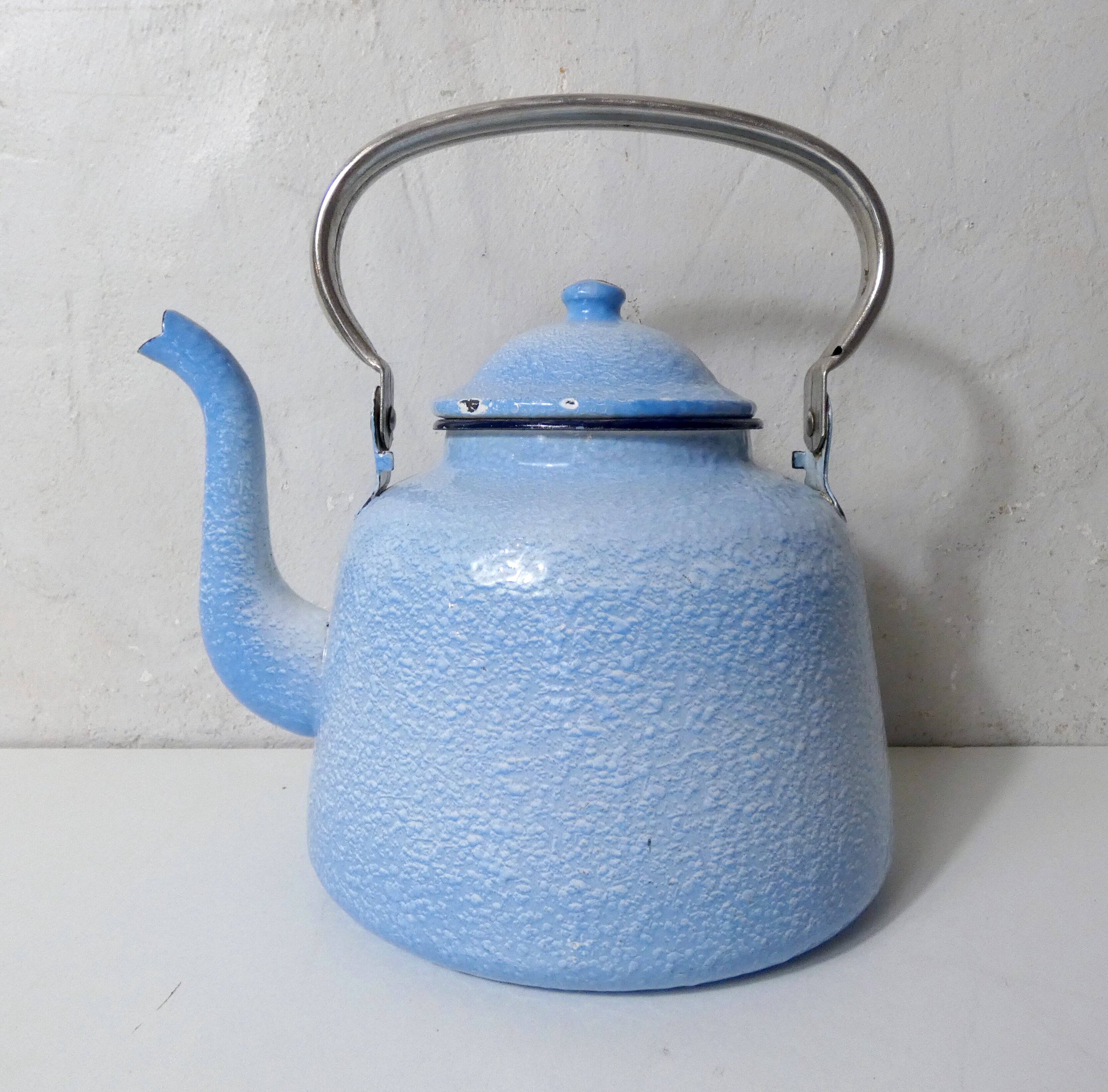 old enamelled steel kettle