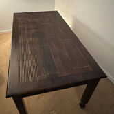 Wenge wood dining table and its 4 chairs.