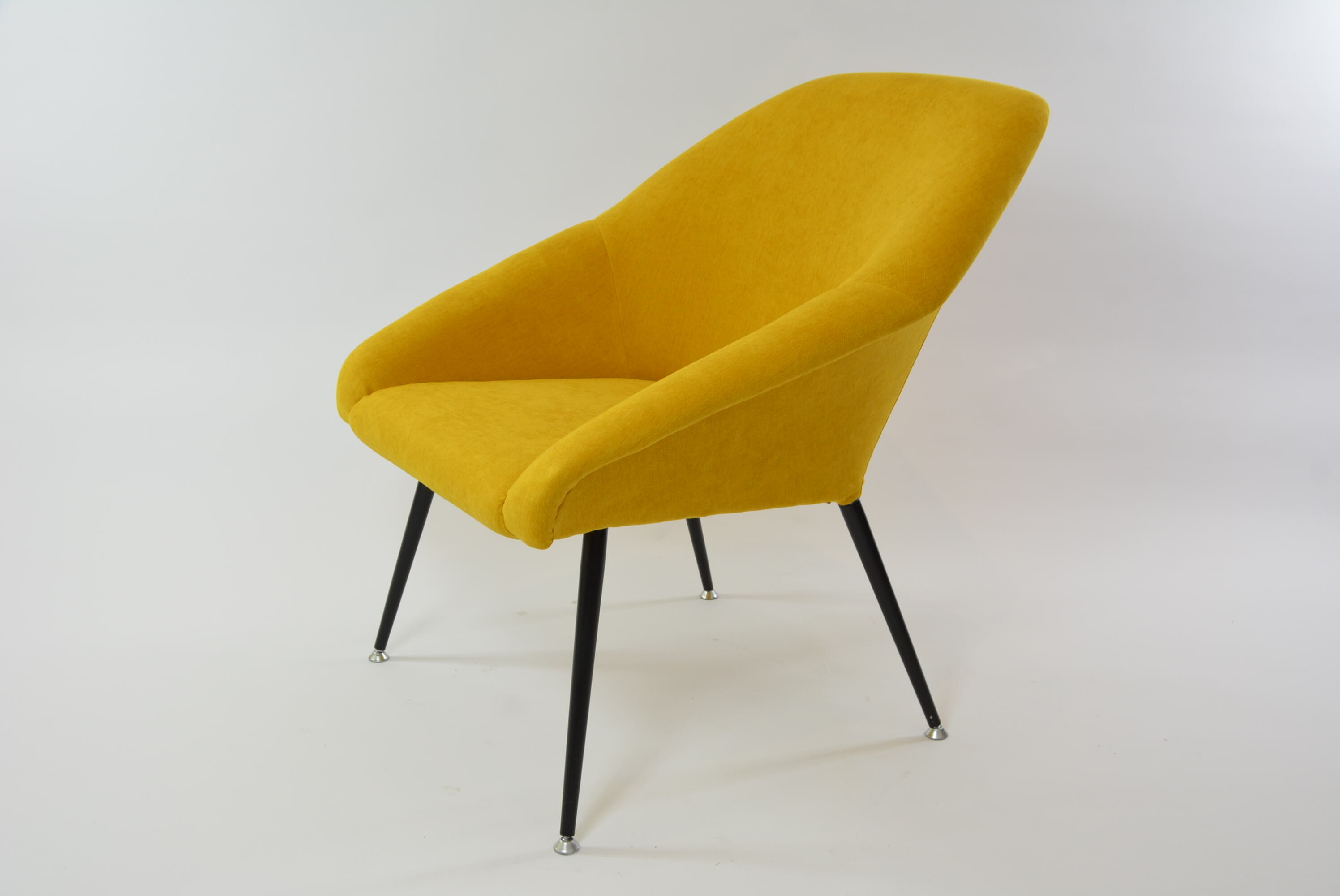 Yellow shell armchair