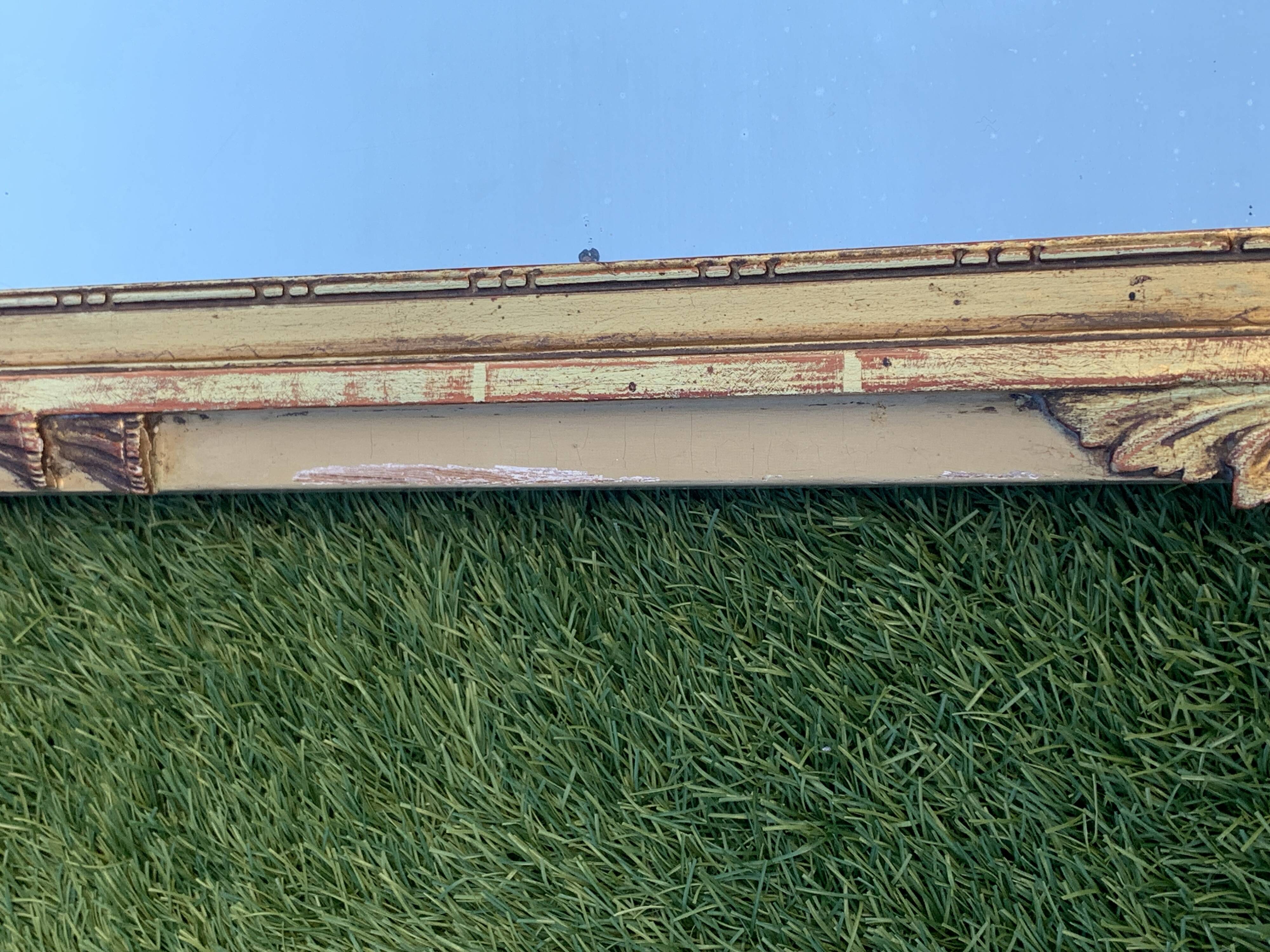 Antique mirror with gilded wood pediment, Louis XVI style