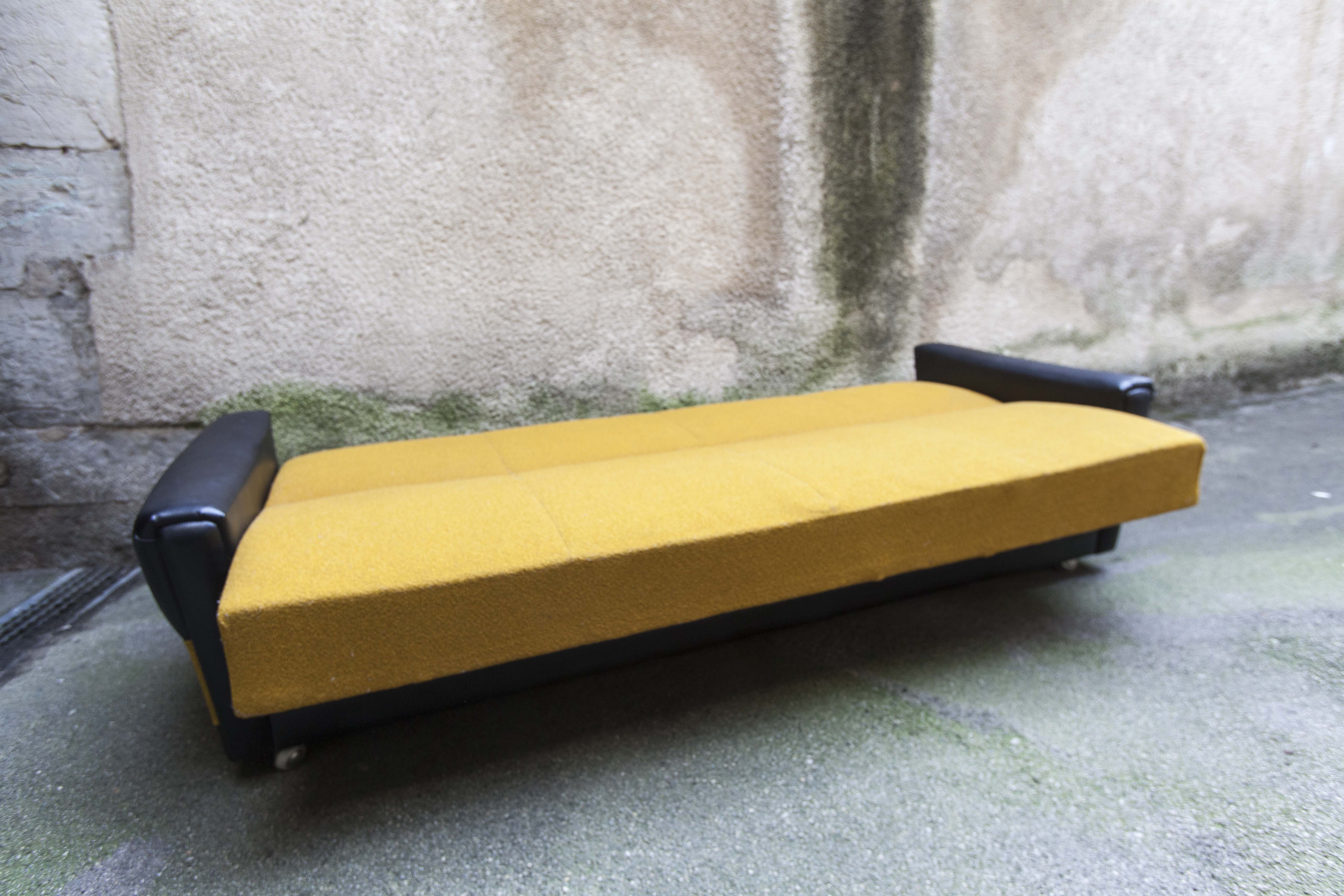 The 1970s gold and black Daybed couch