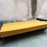 The 1970s gold and black Daybed couch