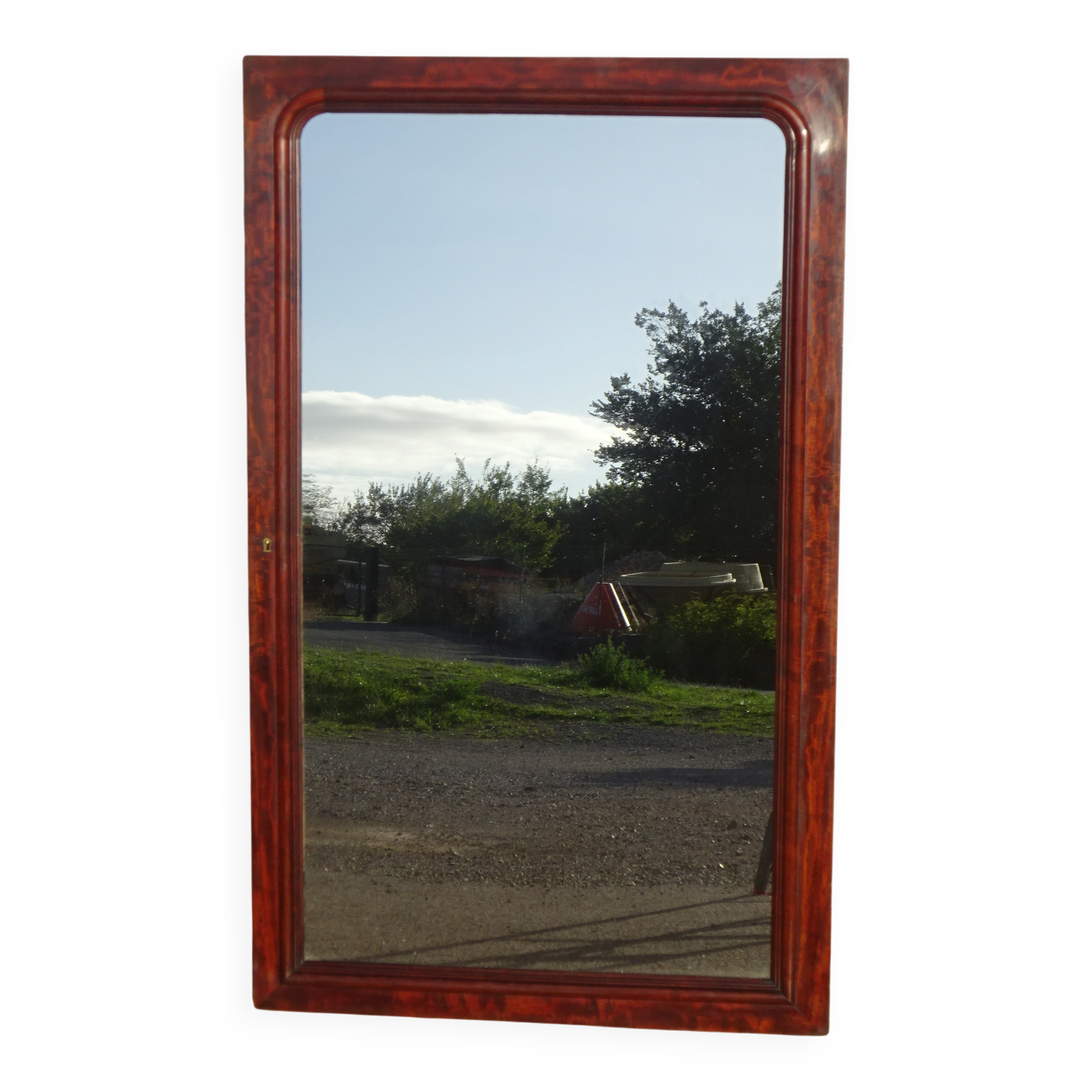 Large antique mirror in a flame mahogany frame; 132x82 cm