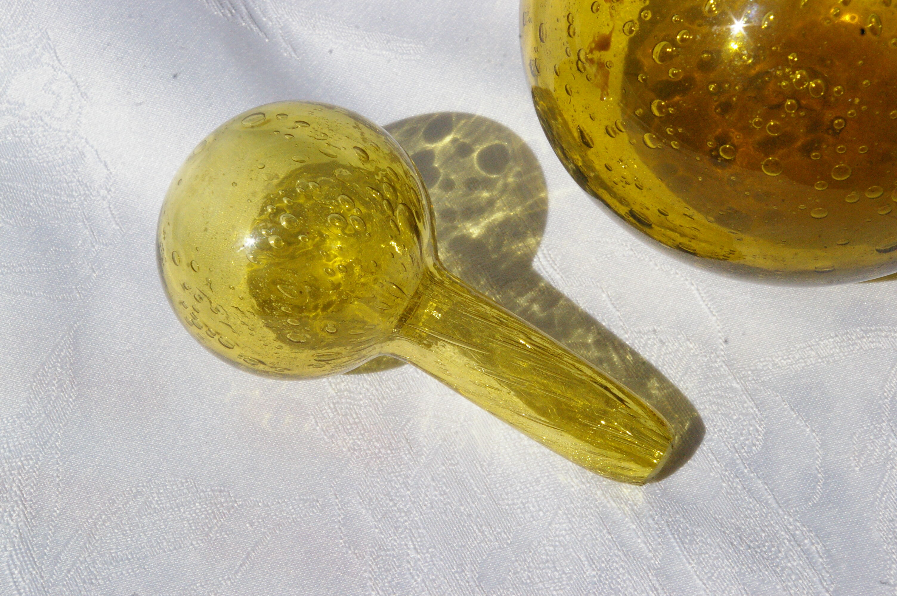 Bottle in bubbled glass of biot