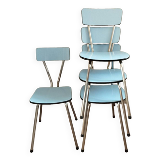 4 blue Formica chairs
