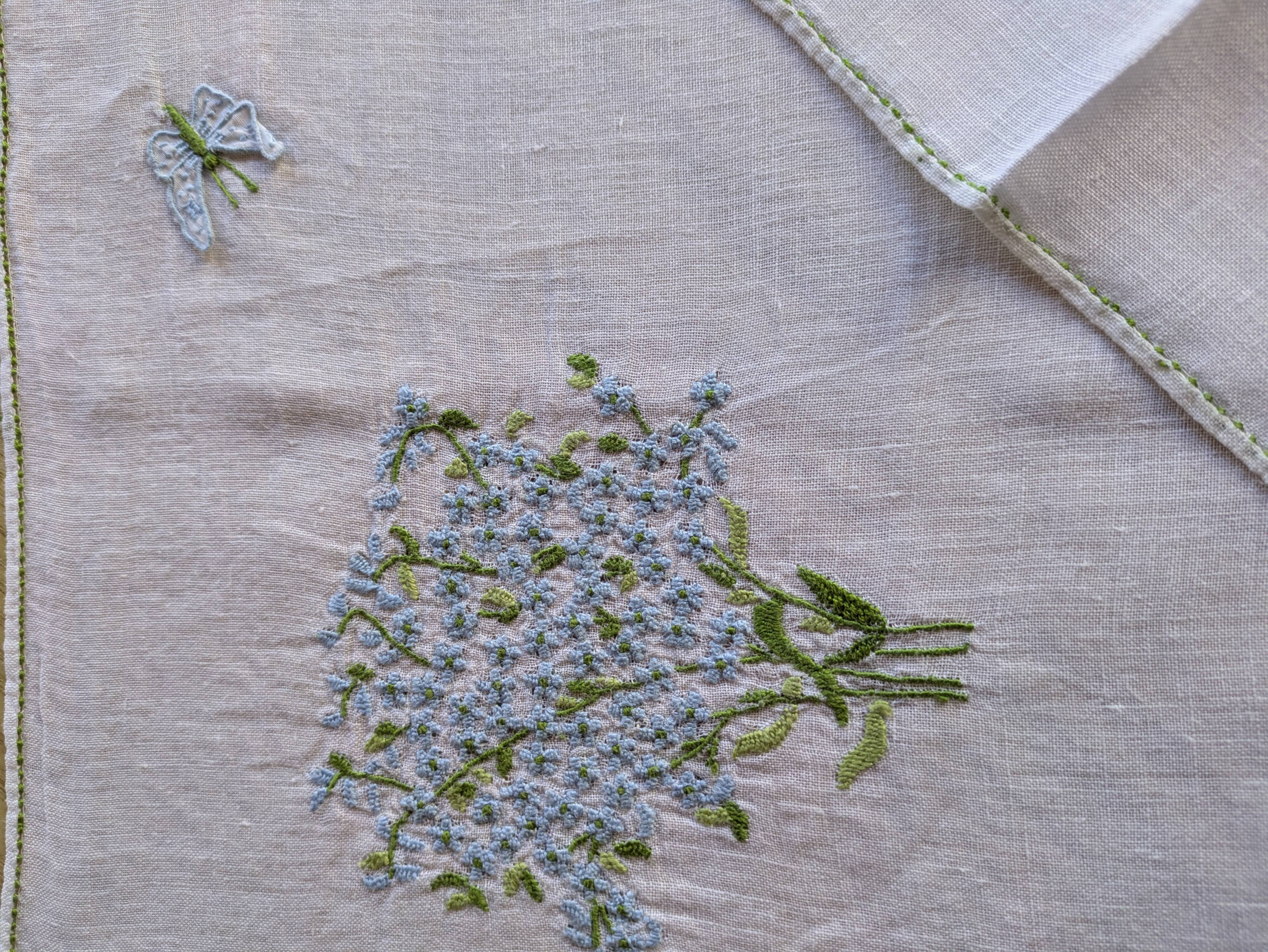 Hand-embroidered table duo in linen voile – Azure Bouquet & Butterfly