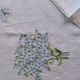 Hand-embroidered table duo in linen voile – Azure Bouquet & Butterfly