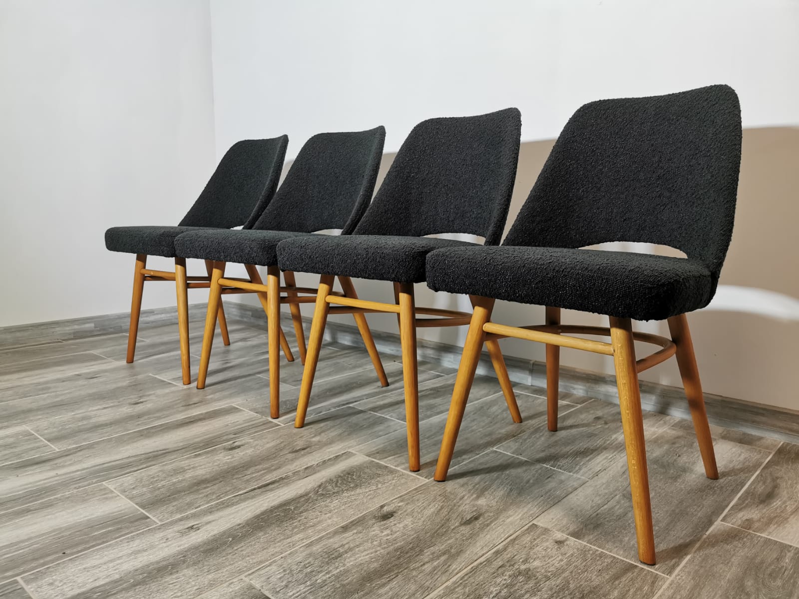Restored dining chairs by Oswald Haerdtl