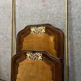 Art Nouveau period bed in painted iron faux wood with stylized colored patterns
