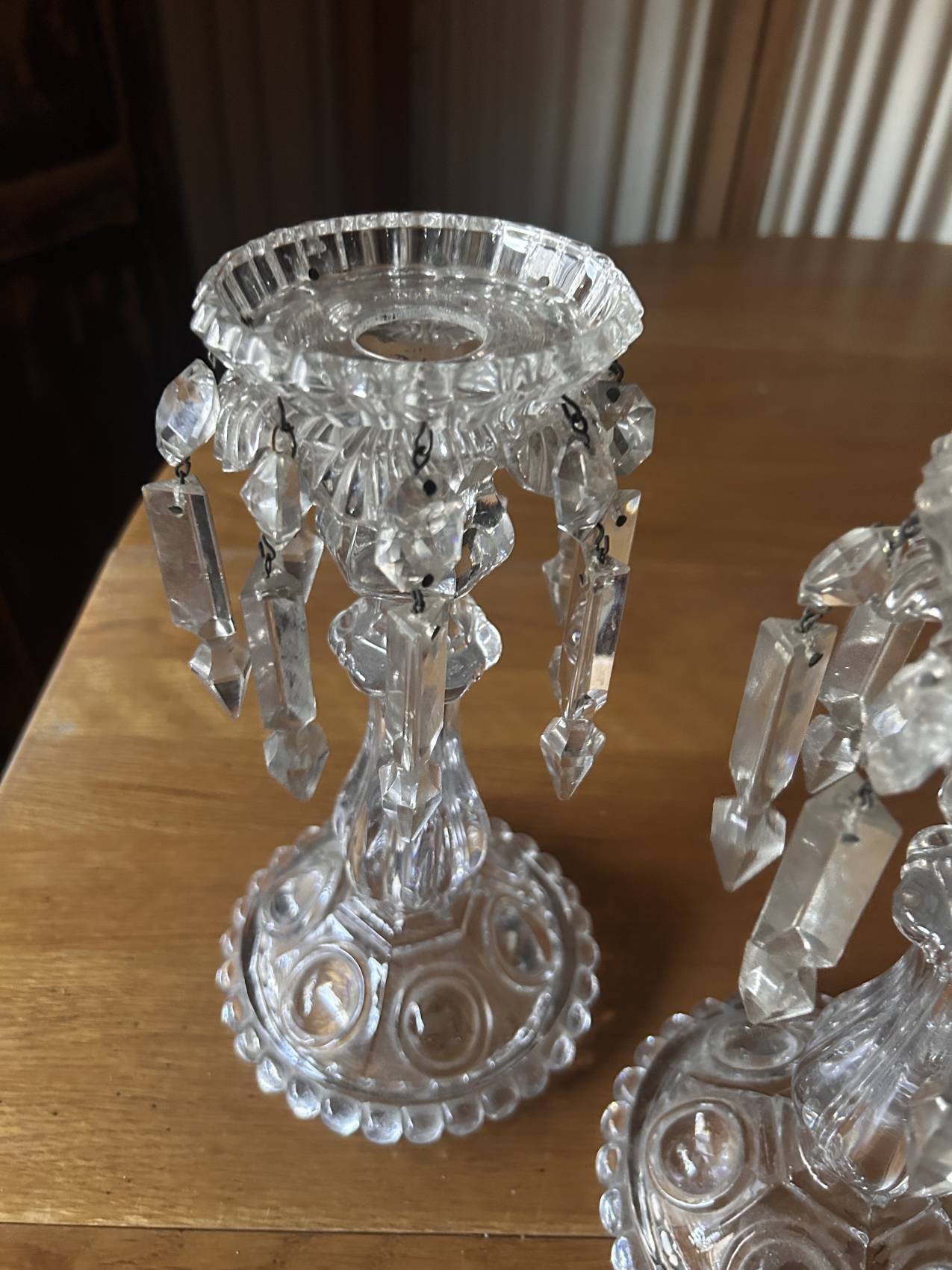 Pair of large Baccarat crystal candlesticks with pendants, a rare choice.