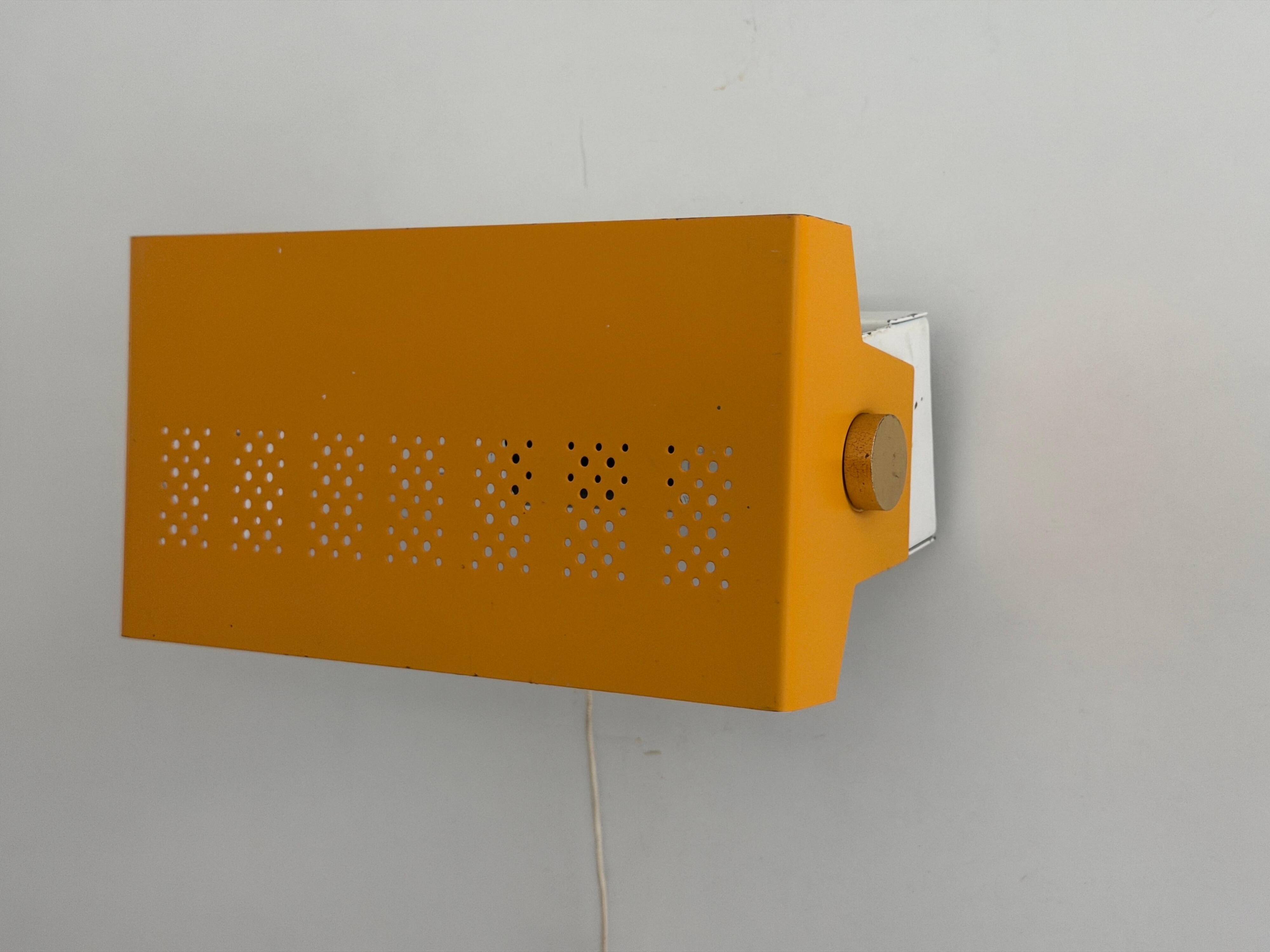 Pair of yellow metal wall lights from the mid-century by N Leuchten, 1960s, Germany.