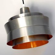 Carl Thore's Trava lamp in aluminium with an orange lacquered interior.
