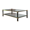 Coffee table in glass and black and gold metal