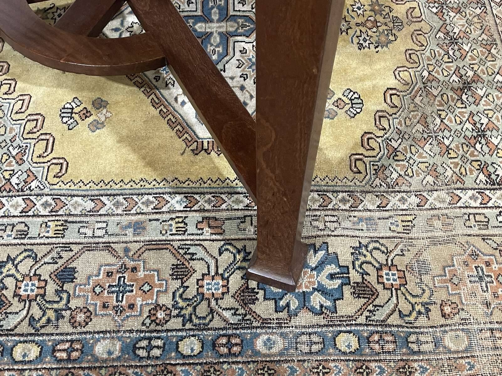 Art Nouveau dining table in mahogany in the style of Gustave Serrurier-Bovy.