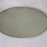 Antique beveled oval mirror