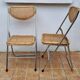 Pair of vintage metal and cane folding chairs
