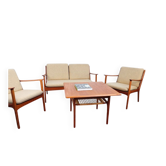 Mid-Century seating set by Ole Wanscher, comprising a Danish teak sofa and armchair from the PJ collection.
