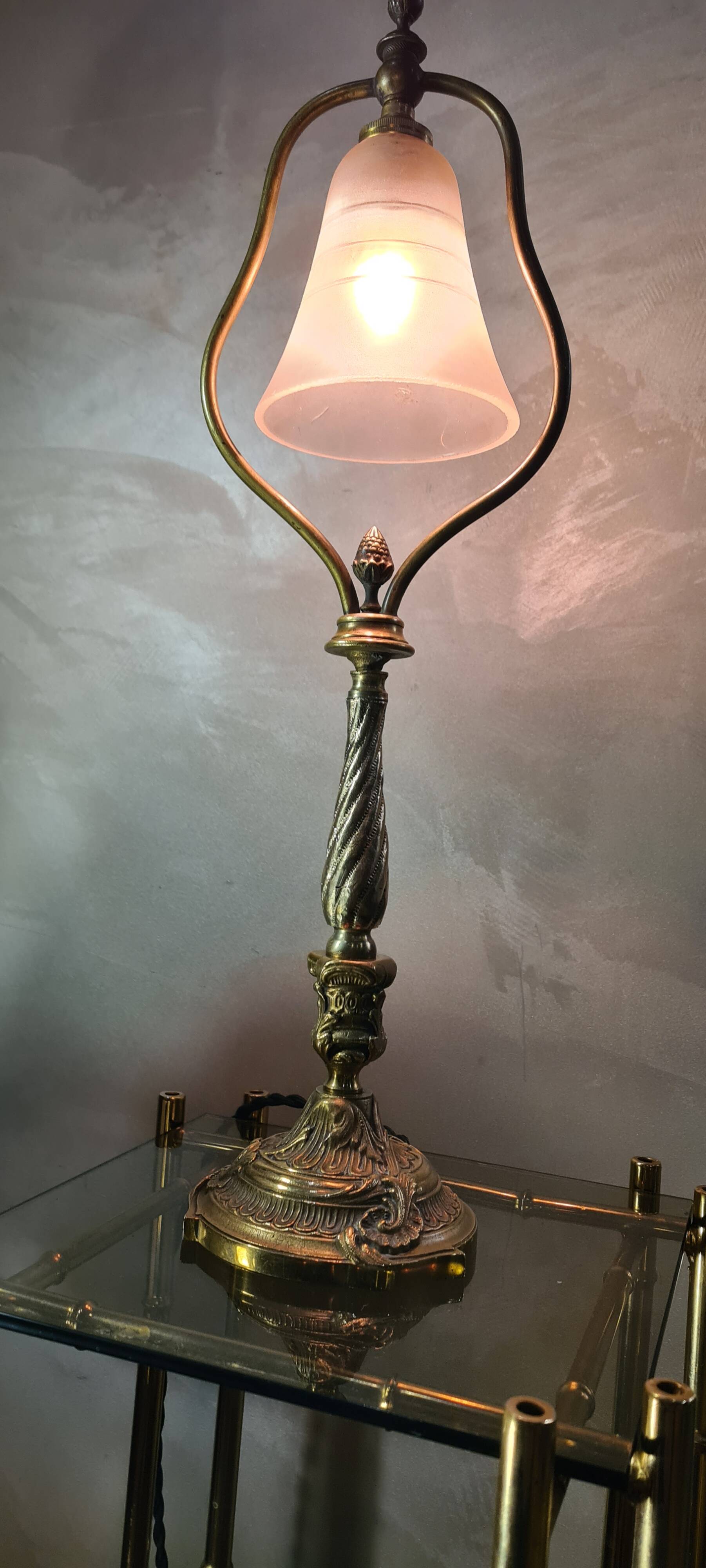 Old lamp in bronze and opaque glass
