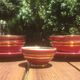 2 lunches - tea cups + sugar bowl - burgundy earthenware with gold trim - vintage 50/60