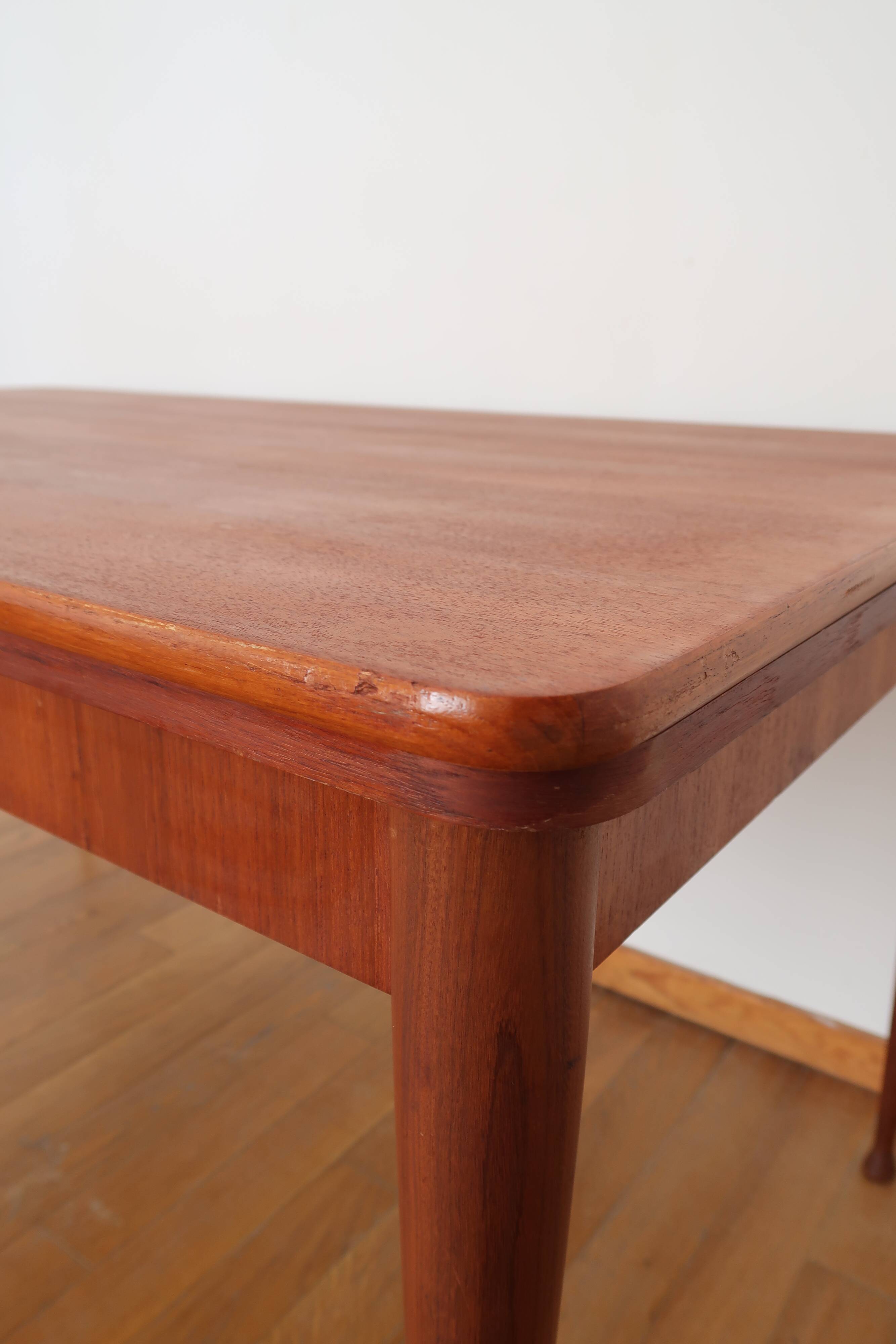 Scandinavian stretch teak table