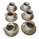 Series of stoneware cups and saucers