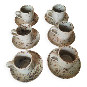 Series of stoneware cups and saucers