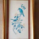Painting with birds in an old golden frame