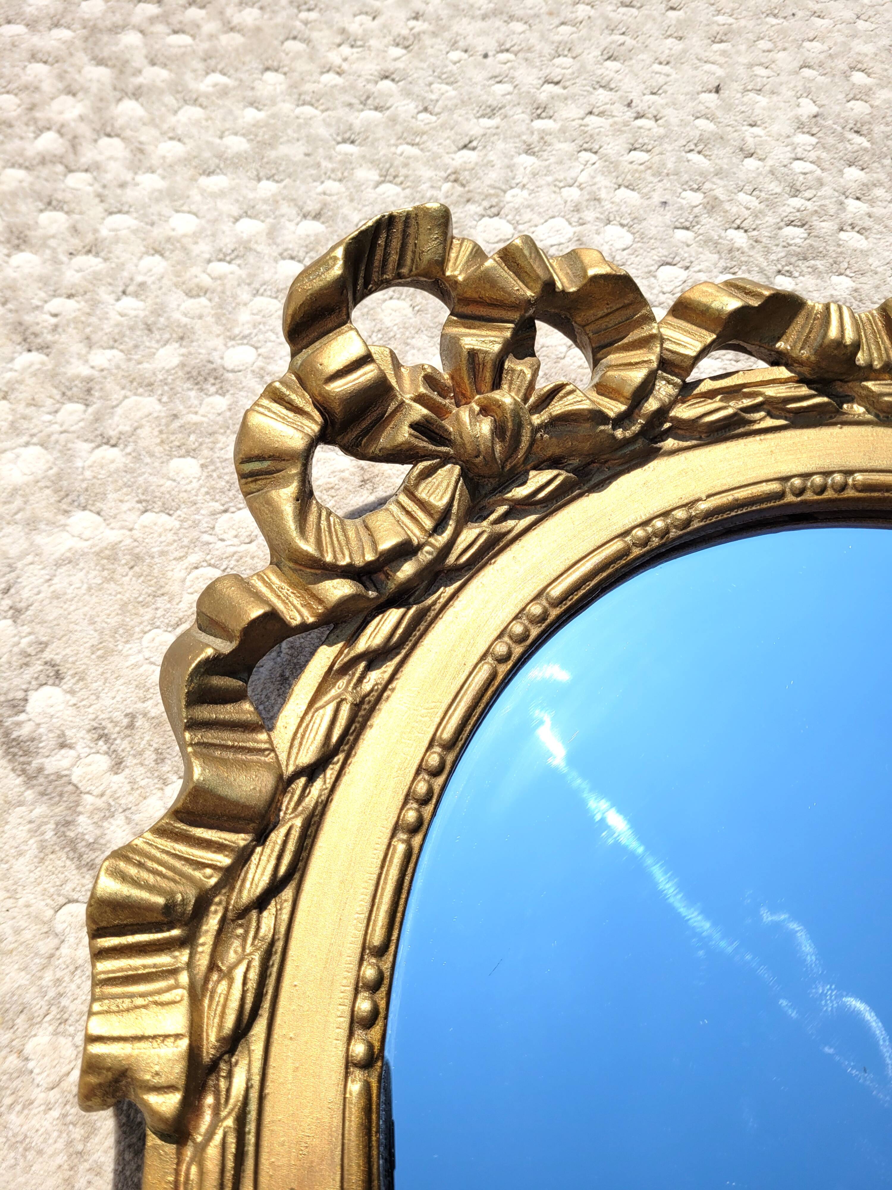 Large oval Louis XVI style mirror 47x65cm