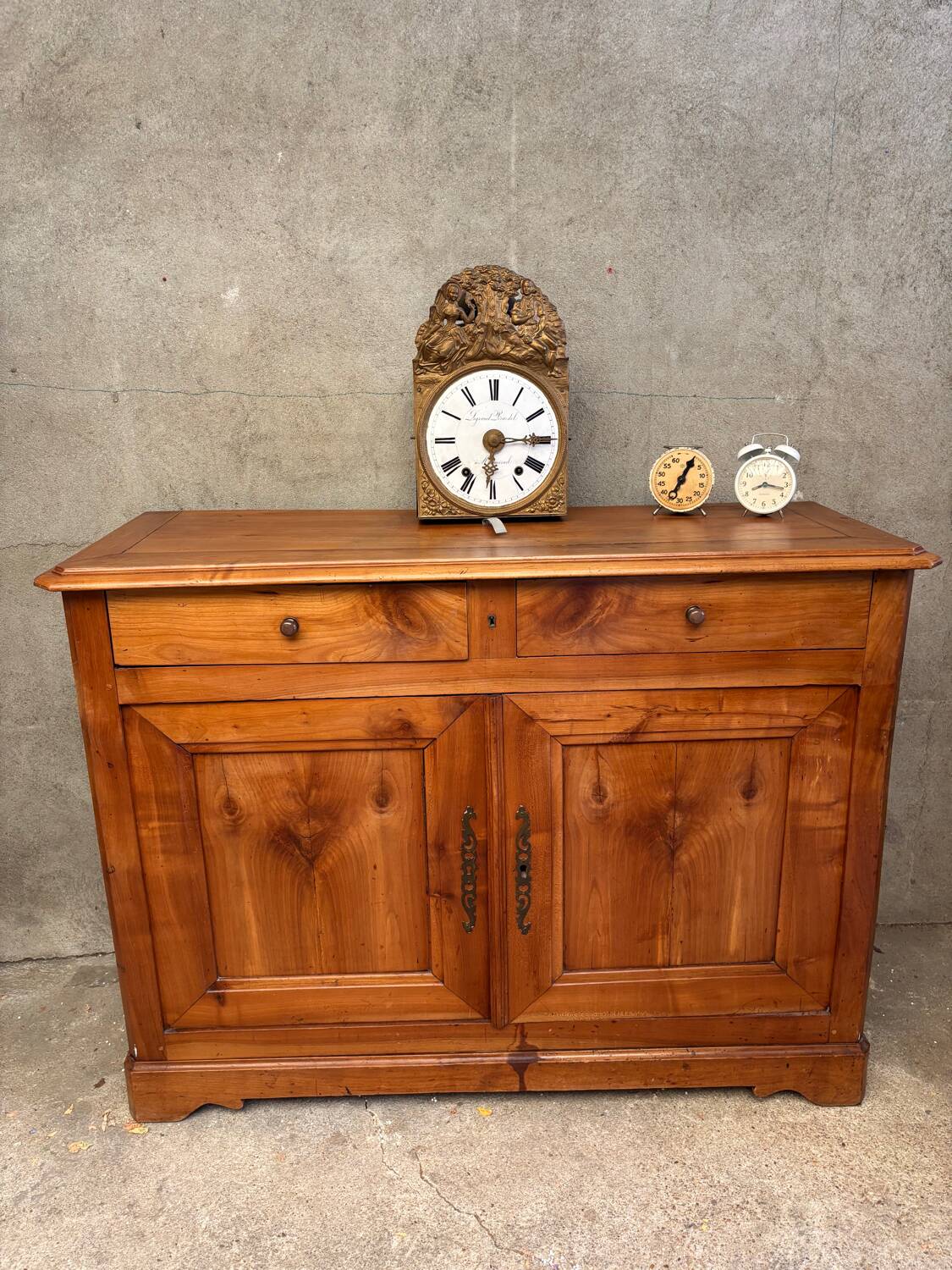 Small cherry wood sideboard in golden honey color